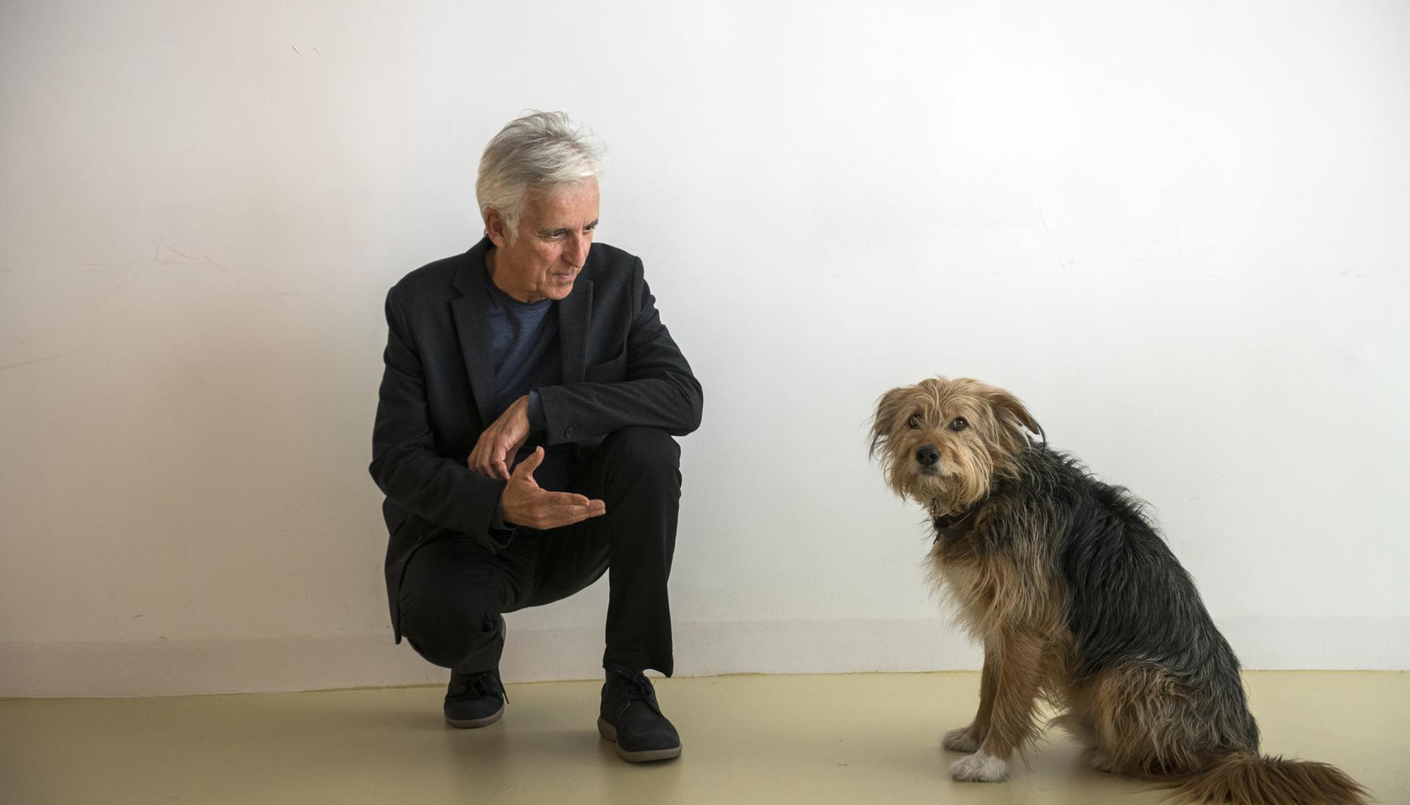 Kiko Veneno y un perro
